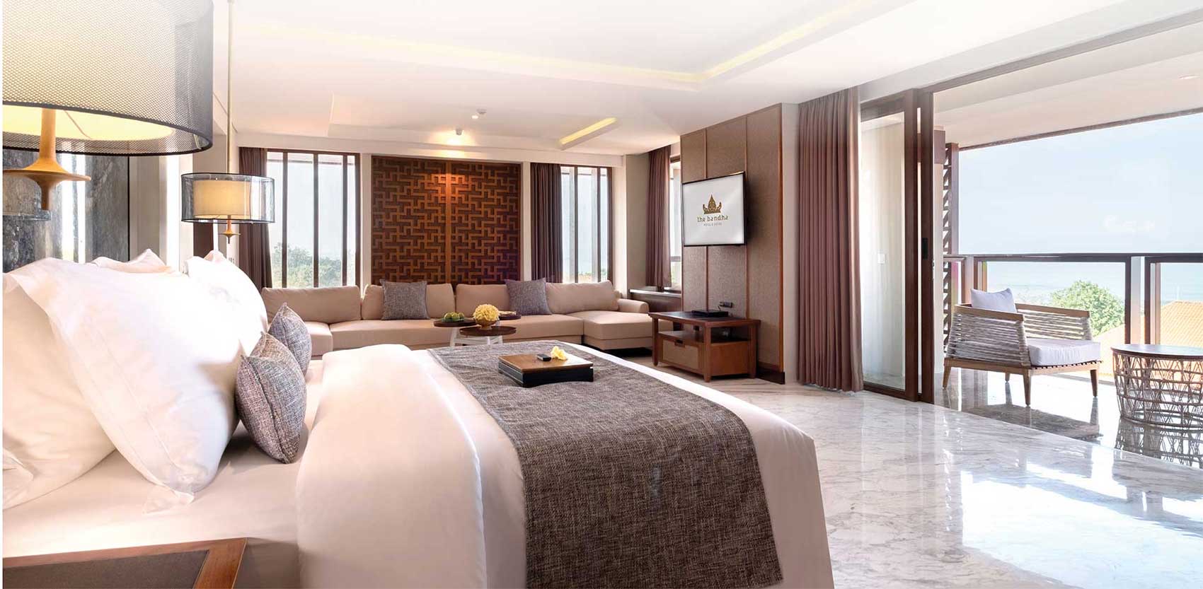 The pool and grounds at The Bandha Hotel & Suites near Legian Beach, Bali