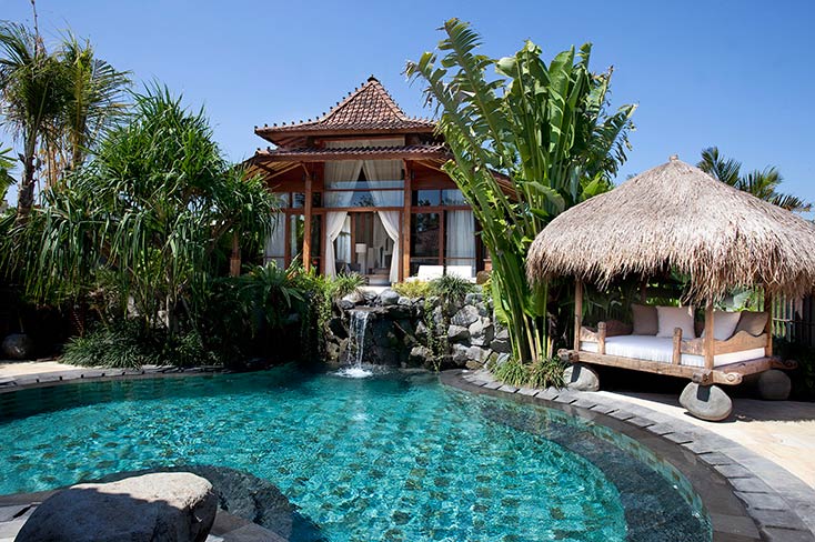 Semi-aerial view of the pool at Villa Sarasvati, part of the Dea Villas estate in Berawa, Canggu
