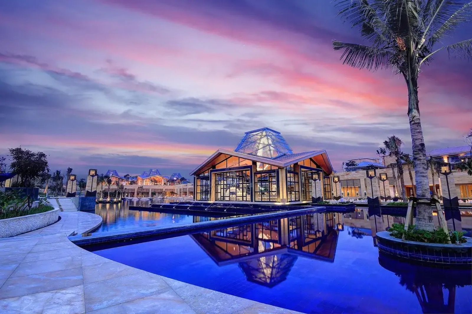 Eternity Chapel, a floating glass wedding chapel over Mulia Lake at The Mulia in Nusa Dua