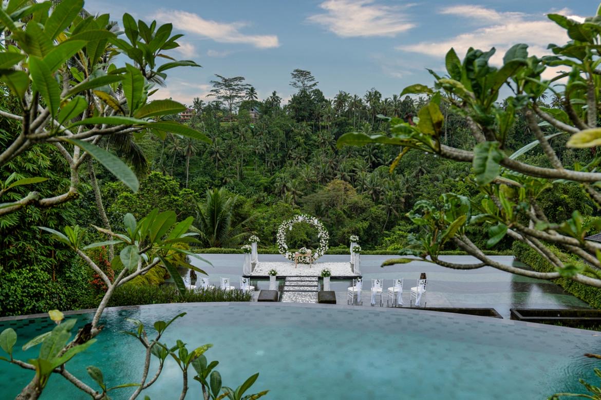 The infinity-pool ceremony deck at Jannata Resort & Spa near Ubud, set above a jungle river valley