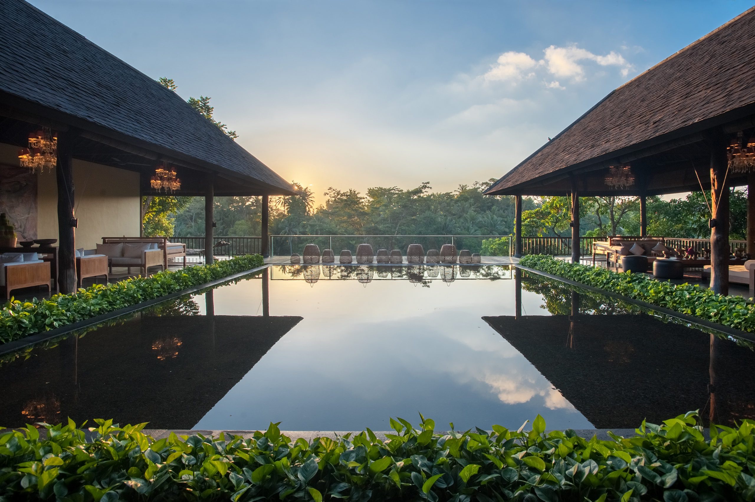 Komaneka at Bisma resort on a slope above the Campuhan river valley in central Ubud, with pool and jungle views