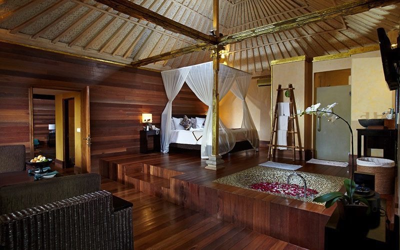 Villas and tropical gardens at Kupu Kupu Barong Villas in Kedewatan, Ubud, on the hillside above the Ayung River valley