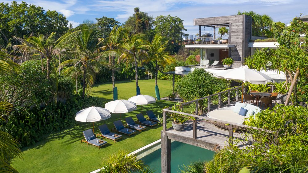 Aerial view of Noku Beach House from Seminyak Beach, the villa and 27 metre pool facing the Indian Ocean