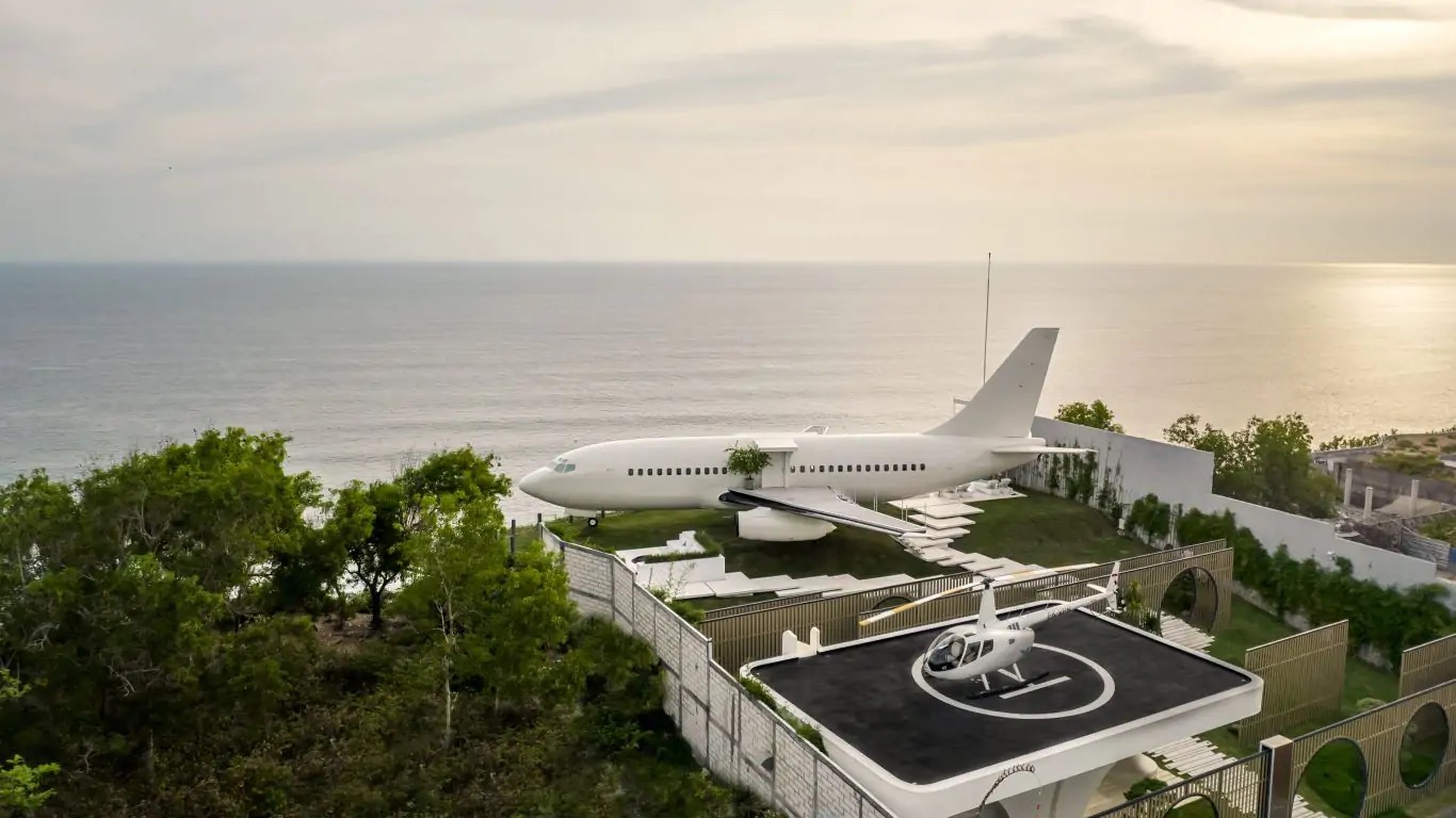 The converted Boeing 737 of Private Jet Villa perched on the Nyang Nyang cliff above the Indian Ocean in Uluwatu