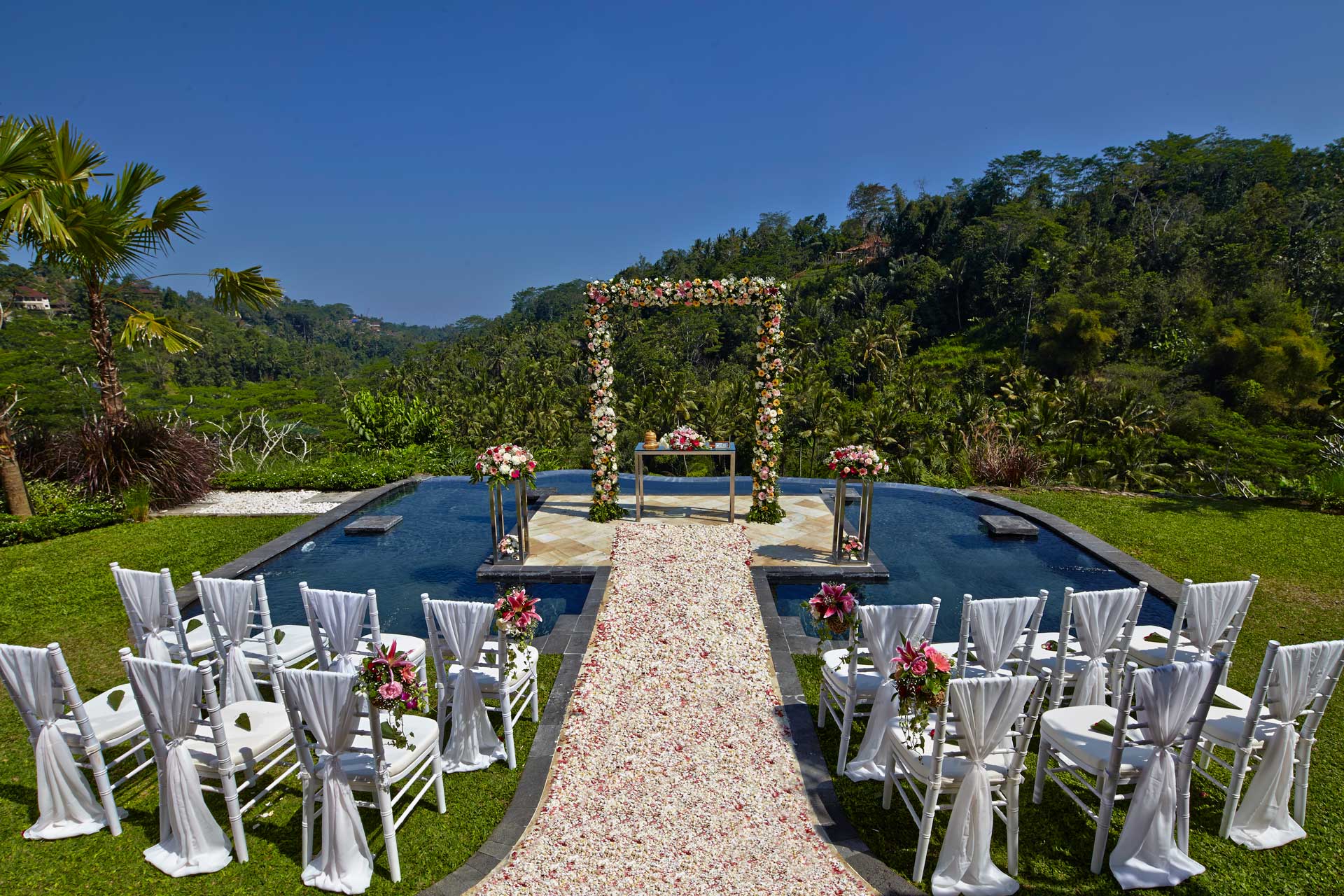 A water blessing wedding ceremony at The Royal Pita Maha in the Ayung river valley on the edge of Ubud