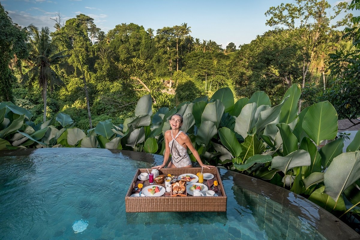 A private pool villa at Tanadewa Resort & Spa Ubud set with a floating breakfast on the water