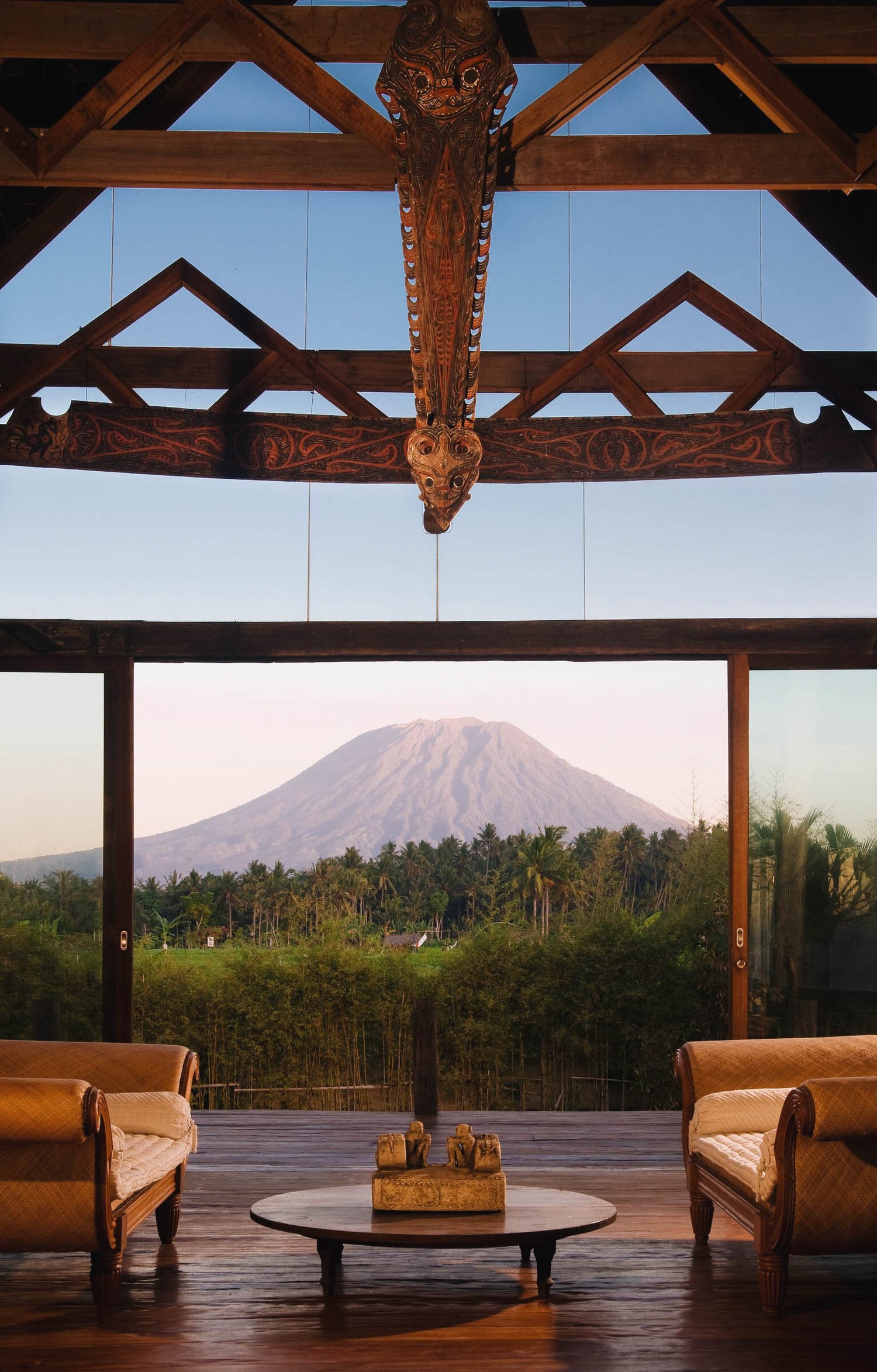 The oceanfront gardens and traditional villas of Villa Campuhan at Jasri, Karangasem, on the Lombok Strait in East Bali