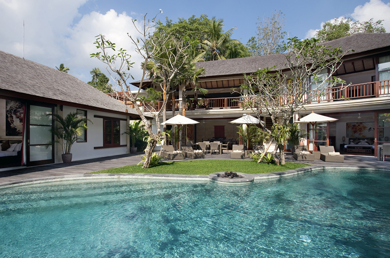 Pool and garden at Villa Iskandar beside the Yeh Penet river near Tanah Lot, Tabanan, with jungle and bamboo beyond