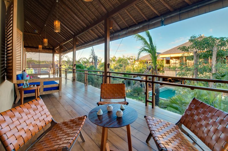 Upper terrace at Villa Kinara looking over the pool and gardens of the Kinaree Estate, Oberoi Seminyak