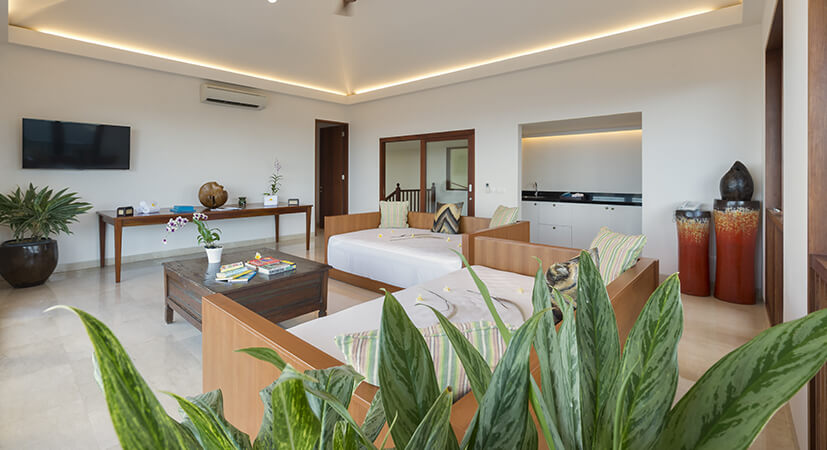 Media room with sofas and TV inside Villa Rose